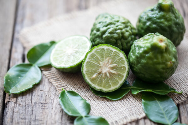 bergamot on sackcloth and wooden background